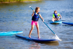kids paddle boarding